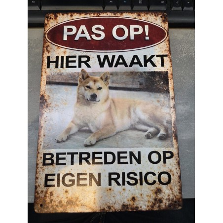 Metalen bord met Pas op hier waakt